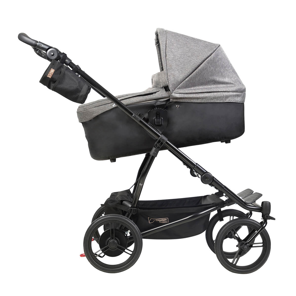 Mountain-Buggy-duet-luxury-herringbone-collection-with-carrycot-plus-in-incline-mode-side.webp