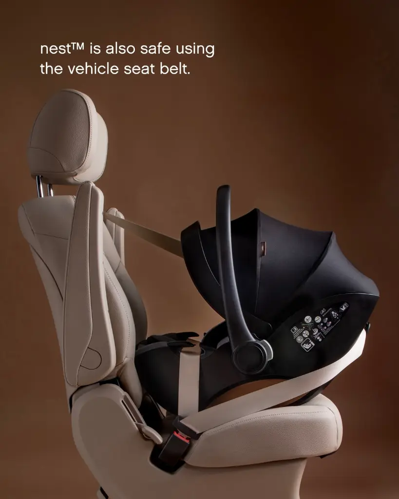 mountain-buggy-nest-car-seat-capsule-without-base-rear-facing-seatbelt-side-view.webp