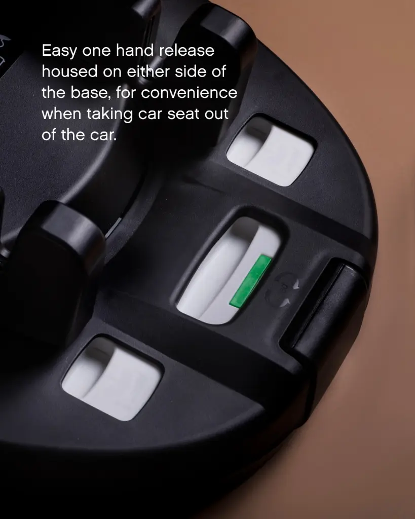 mountain-buggy-nest-car-seat-rotating-base-only-one-hand-release-buttons-closeup.webp