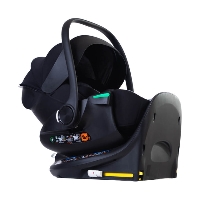 mountain buggy protect infant car seat capsule on isofix base with sunhood and handle extended in three quarter view on a white background
