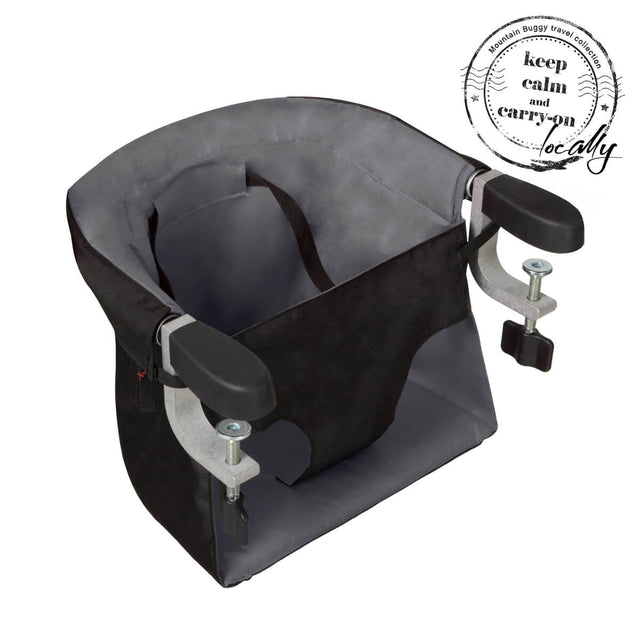 mountain buggy pod portable high chair in flint grey colour clip on close up with KCCO logo_flint