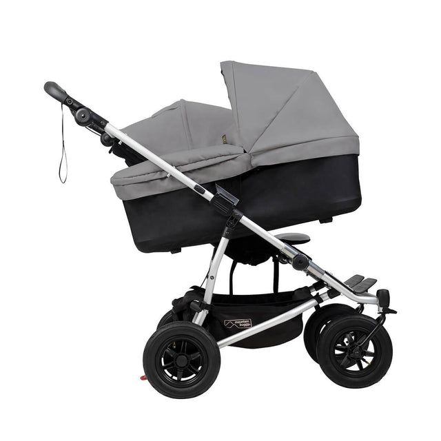 mountain buggy duet double buggy with one carrycot plus in incline mode side view shown in color silver_silver