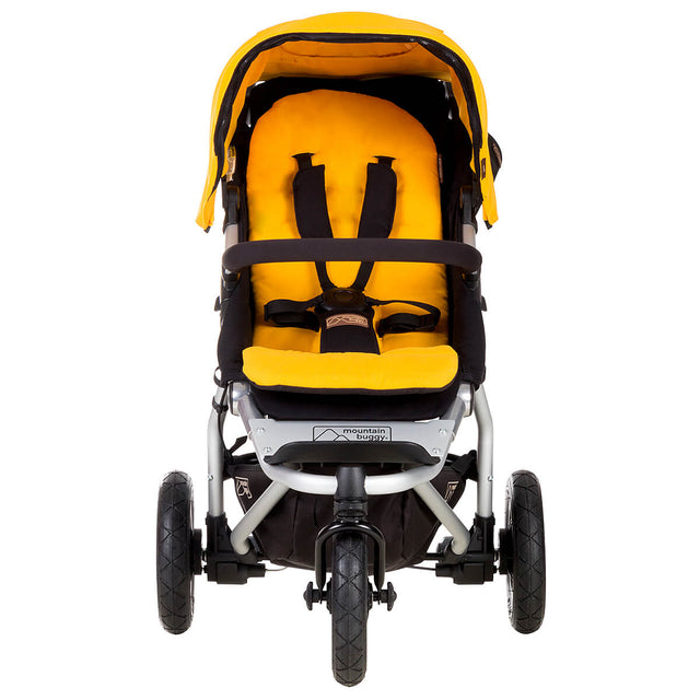 mountain buggy swift compact buggy front view shown in color gold_gold