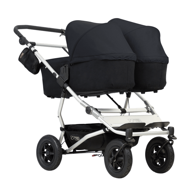 mountain buggy duet double buggy with two carrycot plus in lie flat mode 3/4 view shown in color black_black