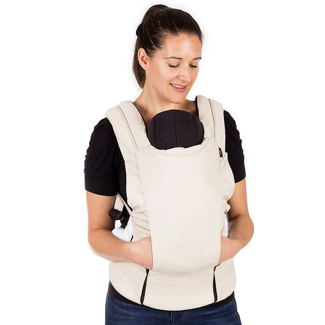 mountain buggy juno baby carrier in sand beige colour with infant insert in use_sand