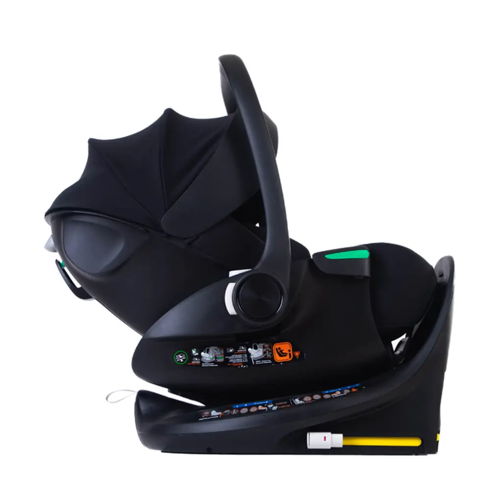 mountain buggy protect infant car seat capsule with handle and sunhood raised on isofix base side view.webp