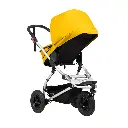Mountain-Buggy-gold-carrycot-plus-on-swift-buggy-in-parent-facing-mode.webp