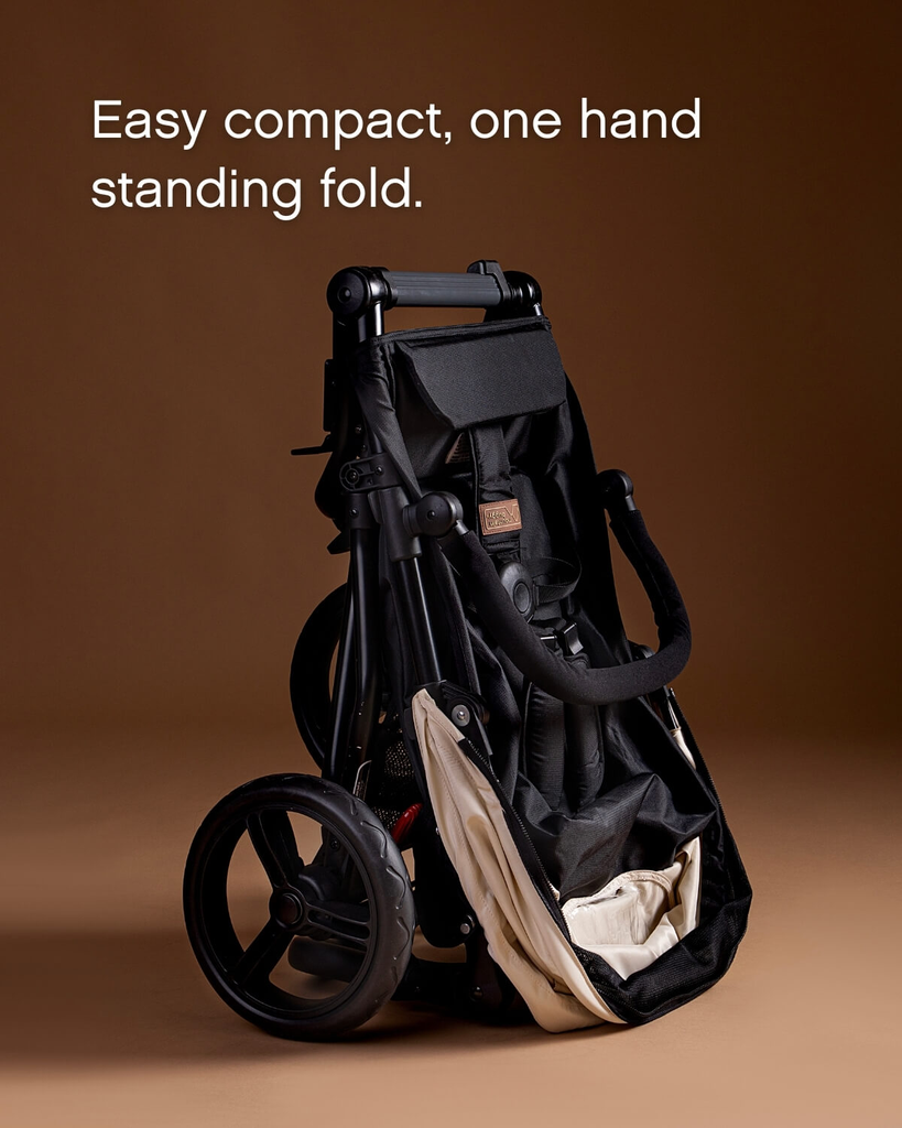 mountain-buggy-swift-buggy-Heritage-Ivory-Standing-Fold.webp