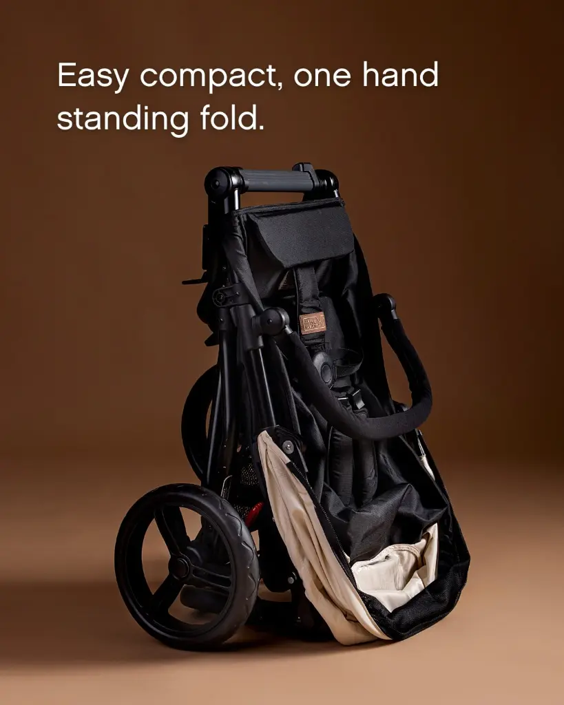mountain-buggy-swift-buggy-Heritage-Ivory-Standing-Fold.webp