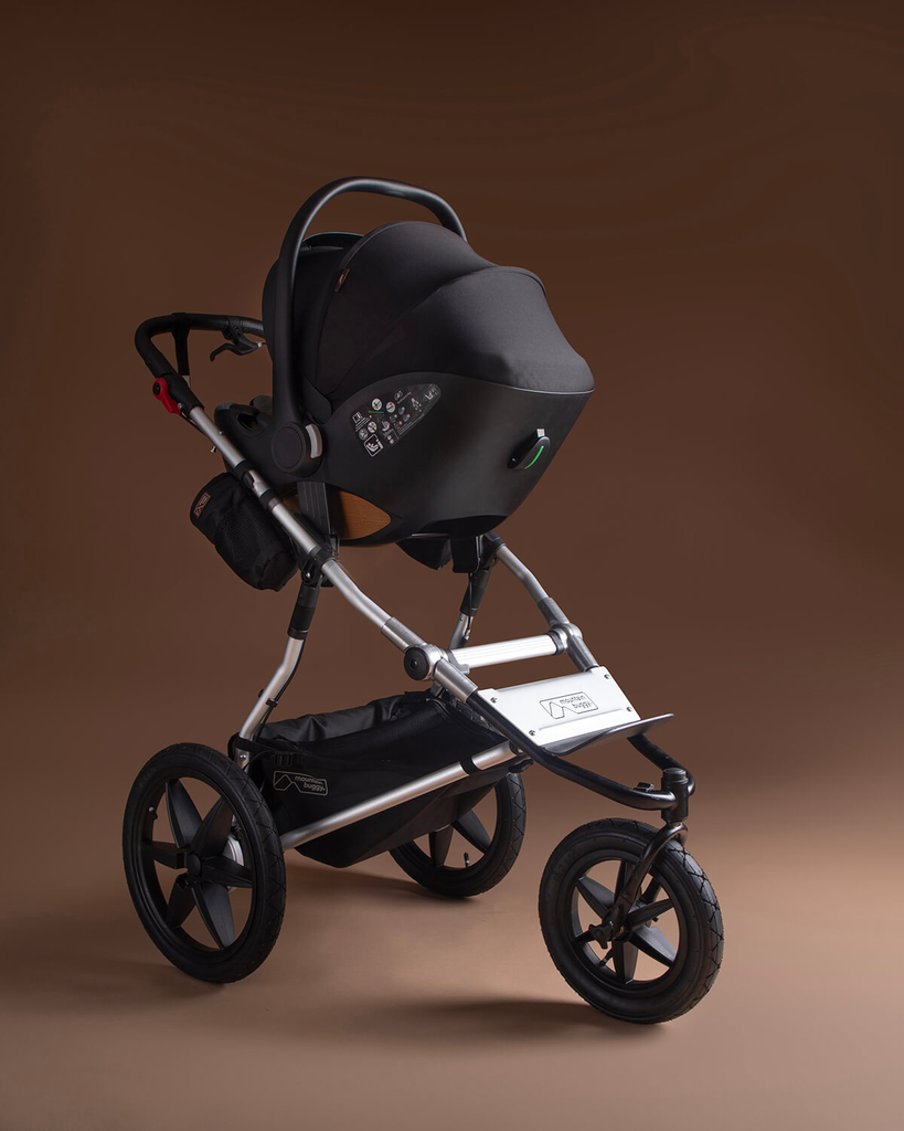 mountain-buggy-nest-car-seat-travel-system-on-Terrain-buggy.webp